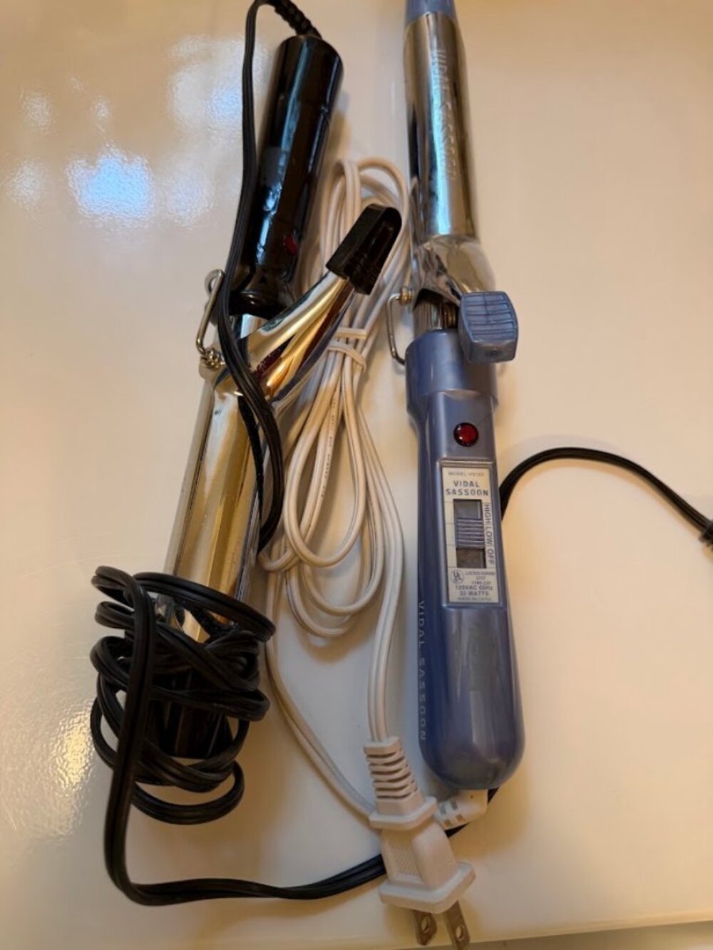 Two Curling Irons - 1 of them is a Vidal Sassoon Hair Styling Curling Iron